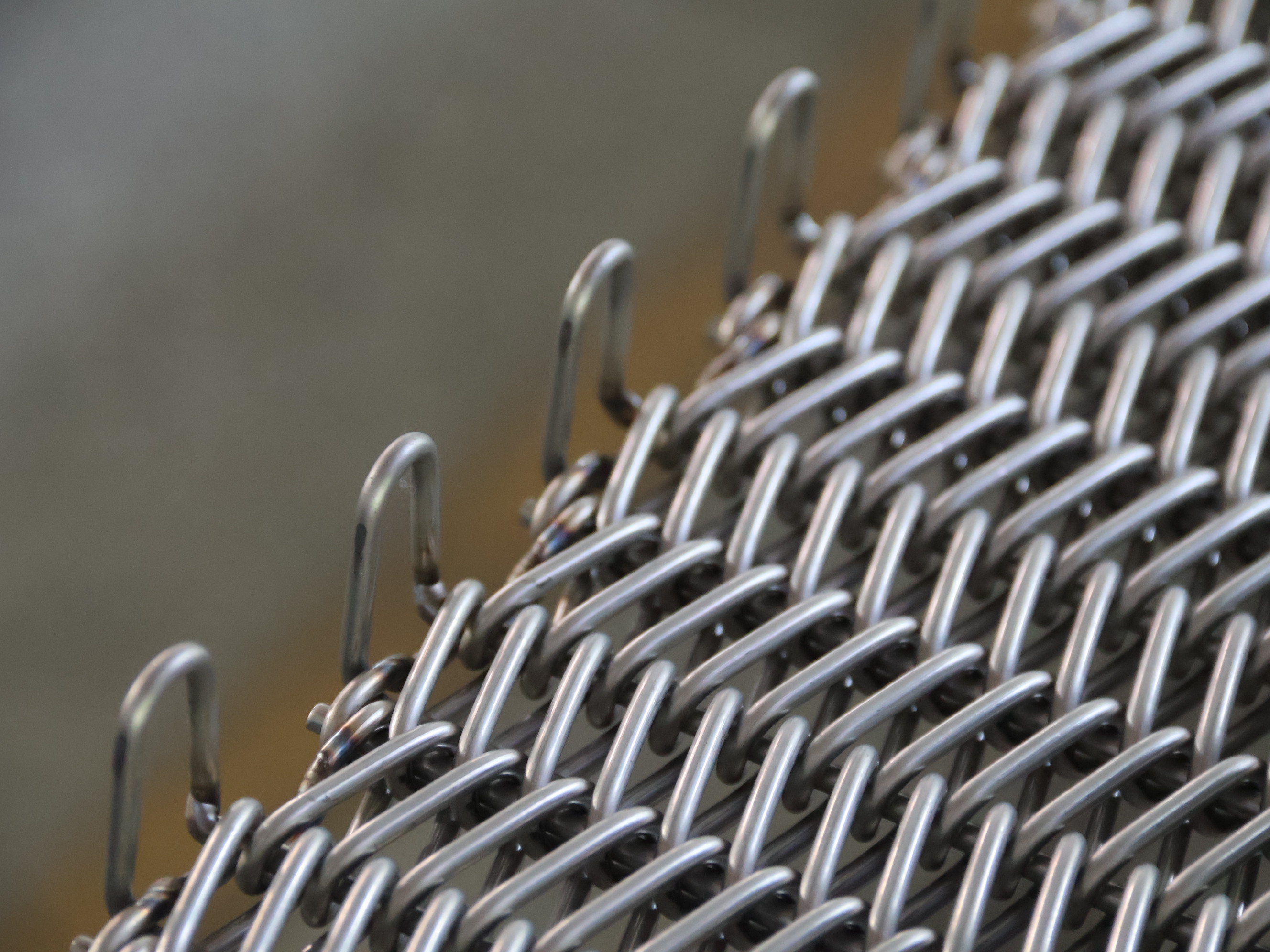 燒結爐金屬網帶穿絲彎曲問題